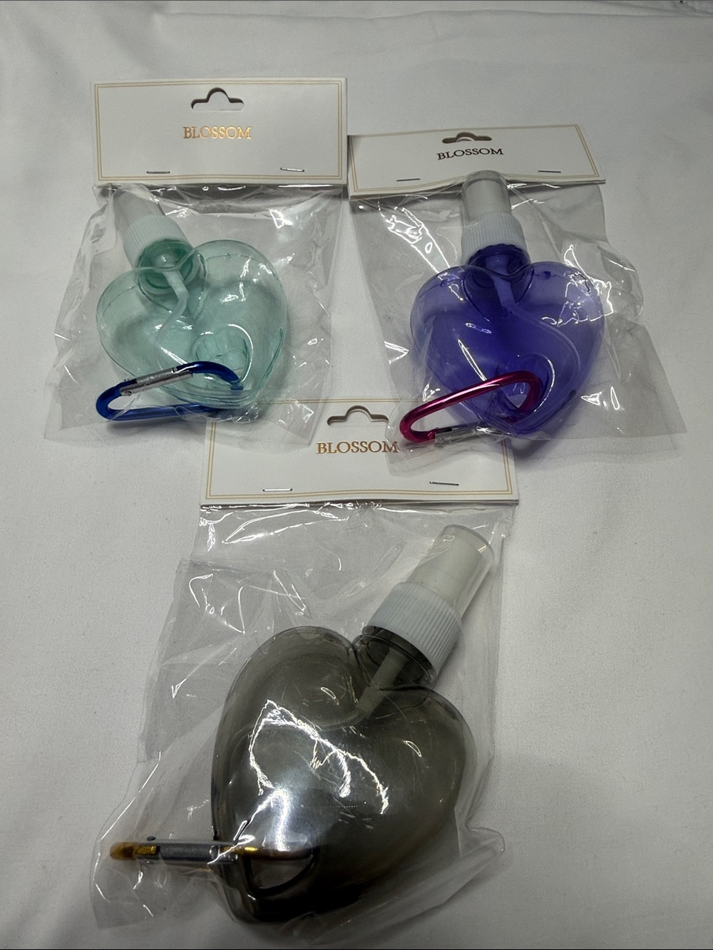 Set of 3 Blossom Heart-Shaped Spray Bottles - Mint, Purple, Smoke